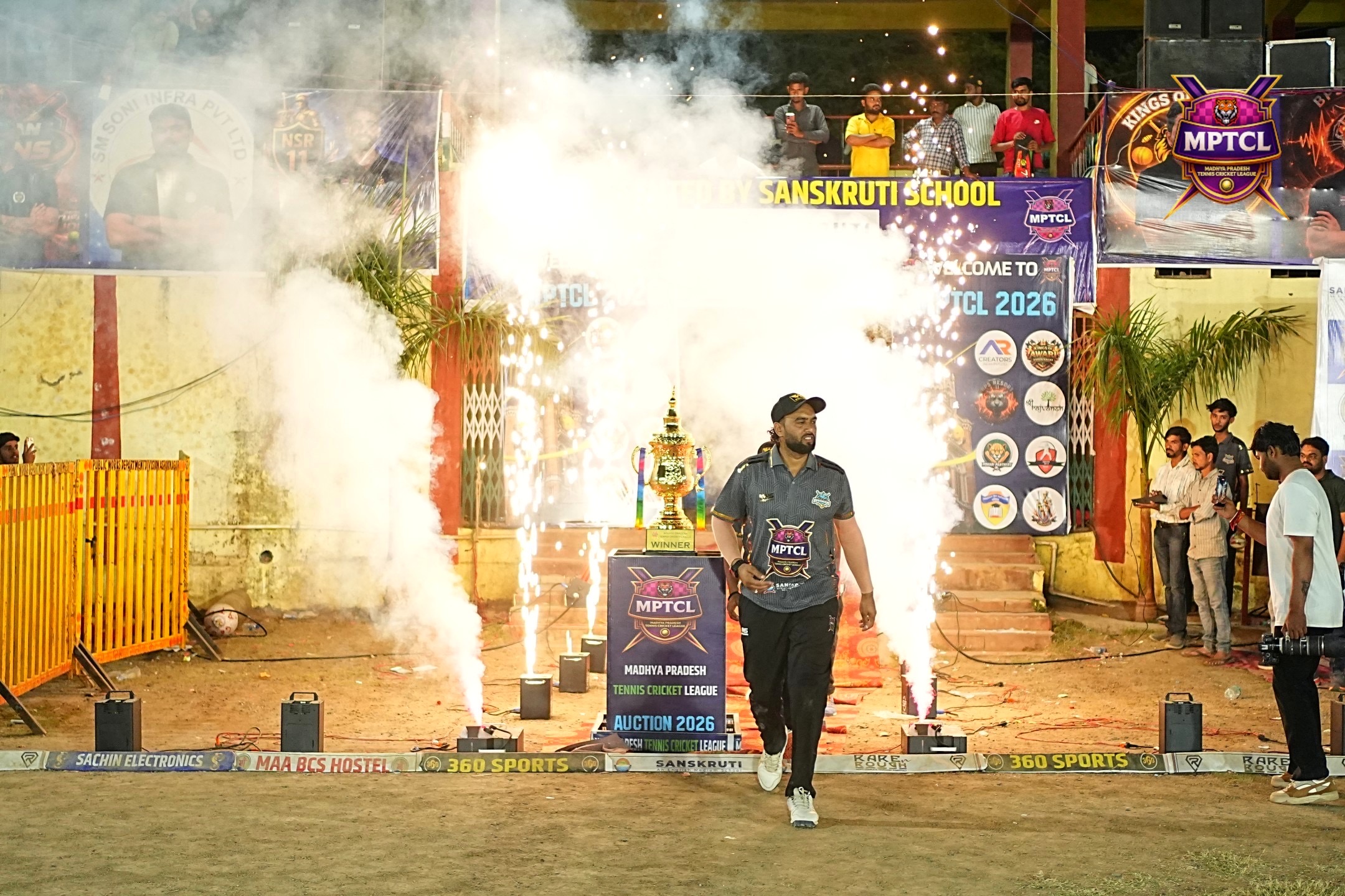 Players entering the venue through smoke and lights at MPTCL 2025